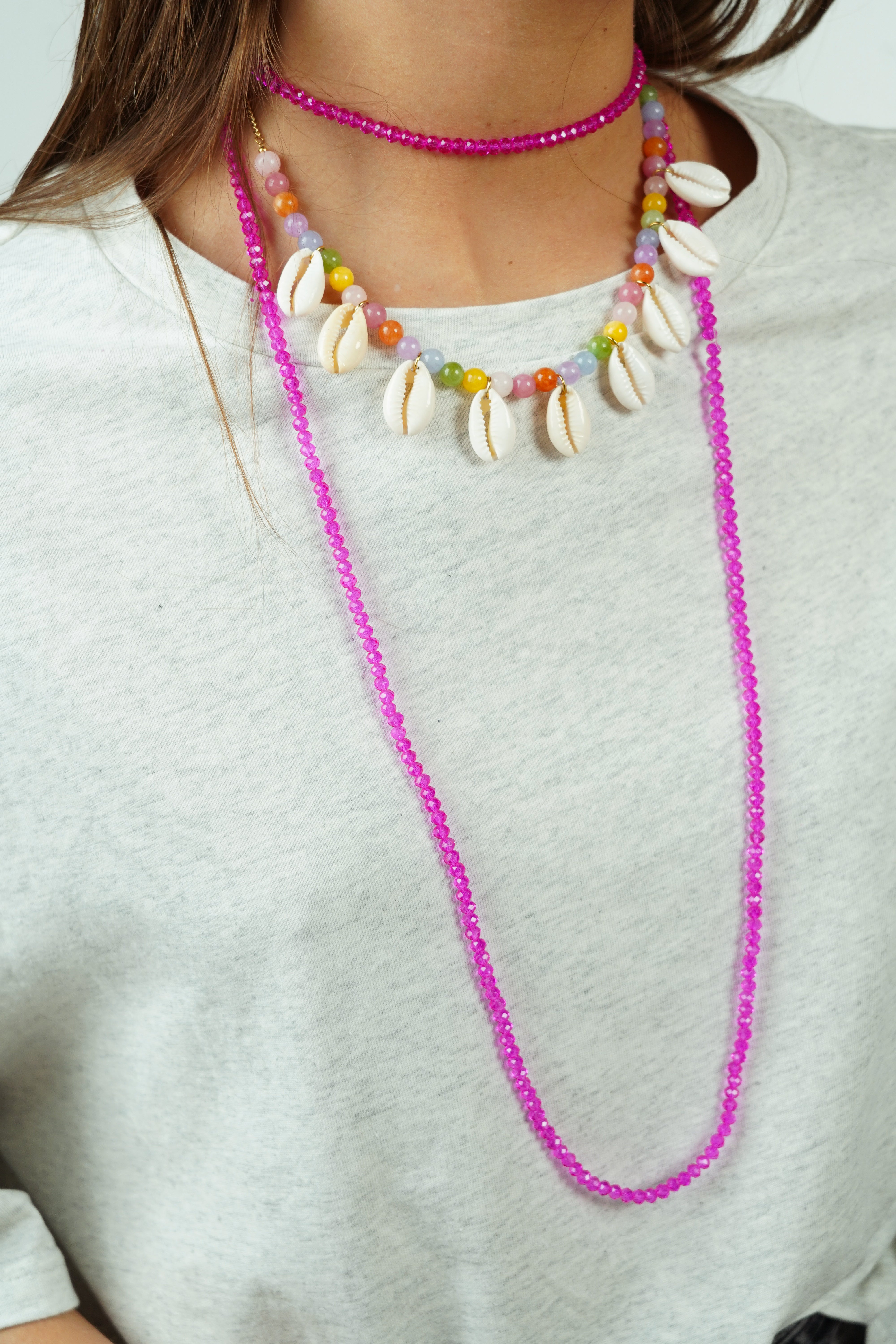 Collier en perles rose fuschia