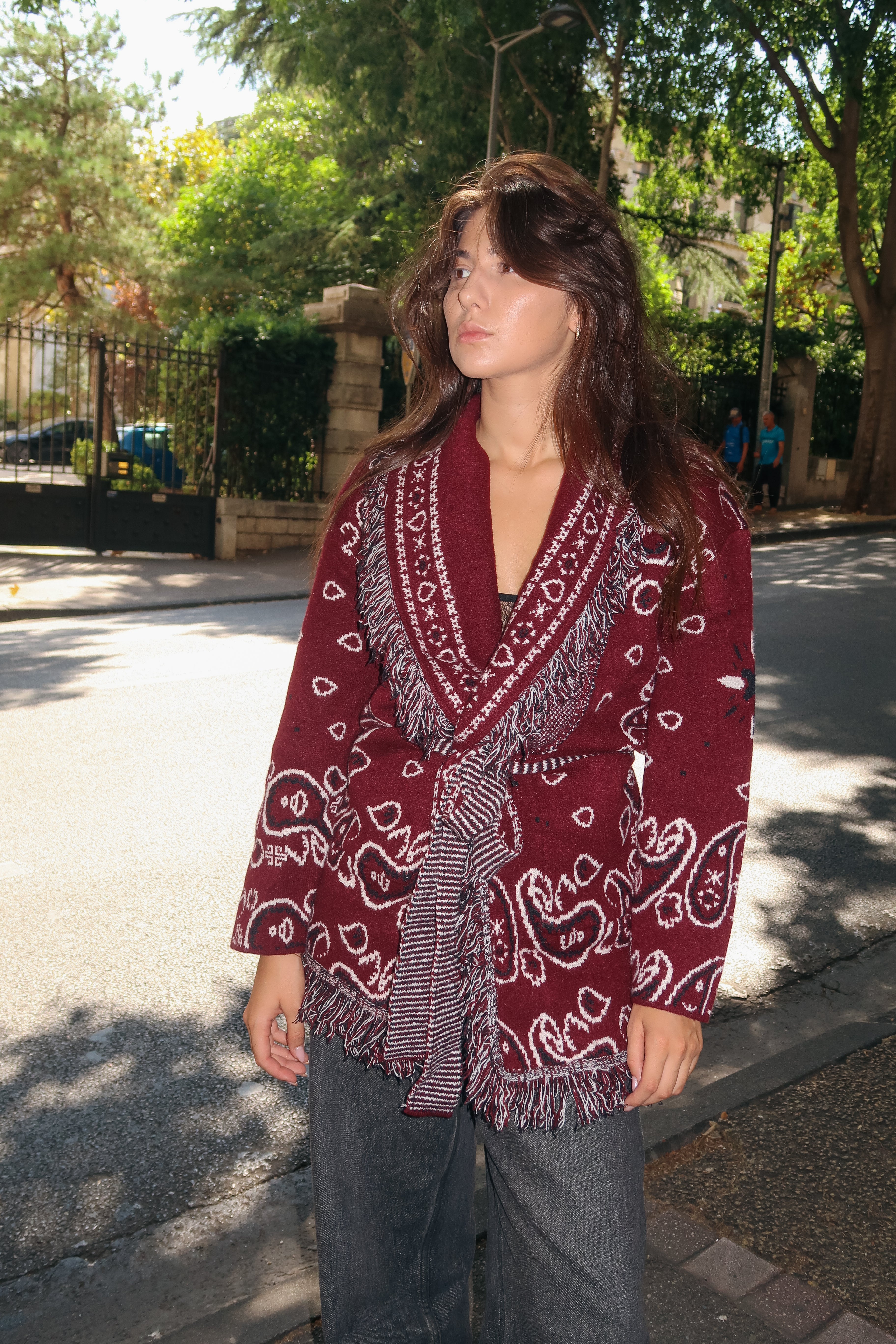 Oversized sleeveless burgundy long vest with bandana pattern and